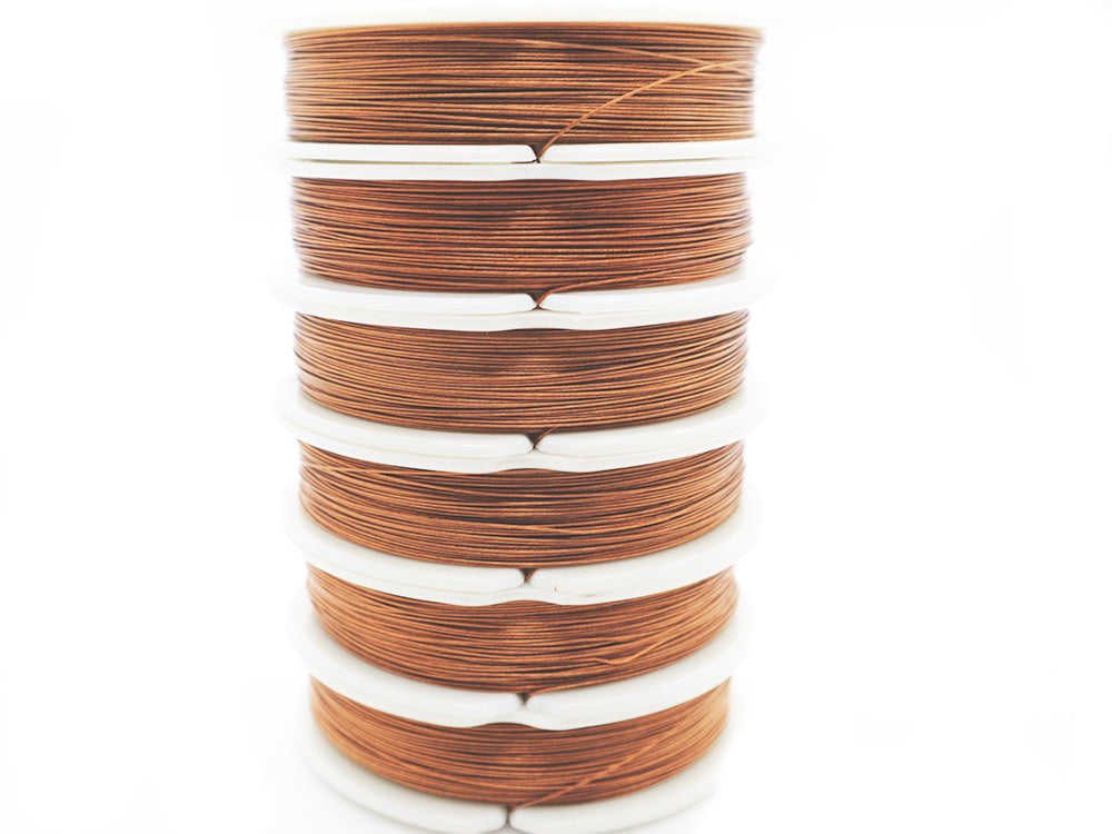 Tiger Tail Beading Wire in a Copper Color Tall Stack